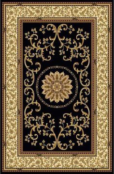 a black and gold rug with an ornate design on the bottom, surrounded by scrolls