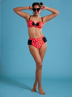 Feel cute like polka dots with these swim bottoms inspired by Minnie Mouse. Made in her iconic colors of red and white  its covered in polka dots and Minnie Mouse heads  plus black ruffle detailing all around. Pair with the matching top to complete your look!Top not included.Swimwear can only be returned unworn with original tags intact and sanitary panel in place.82% polyester; 18% spandexHand wash cold; dry flatImportedListed in junior sizesModel is 5'9''Model wears size Small Disney Swimwear, Hoodie Girl, Swim Bottoms, Matching Top, Black Ruffle, Hot Topic, Bathing Suits, Minnie Mouse, Polka Dot