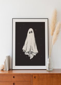 a black and white image of a ghost floating in the air