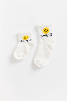 Soft kids socks with Smily faces on each ankle Non-slip grips on bottom Cute White Non-slip Socks, White Fun Non-slip Socks, Fun White Non-slip Socks, White Non-slip Fun Socks, Playful White Cotton Socks, White Socks For Playtime, Playful Non-slip Cotton Socks, Playful White Winter Socks, Playful White Socks