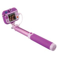 a pink and purple camera is attached to a tripod