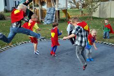 a group of children playing on a trampoline