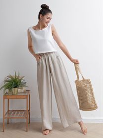 "★★FEATURES 100% Linen Two side pockets Adjustable drawstring Elastic, high waisted pants Pleated waist details Wide leg linen pants Long linen pants Perfect for Summer, Spring, Autumn ★★ Model Size Height approx 162 cm (5′ 4″) Bust 84 cm (33\") Waist 66 cm (26\") She wears size XS. ★★ Bespoke Order Service If you Request other color Request the length Your height is not between 155 cm- 172 cm Your weight is over 75 kg I can do it for you, It will need some extra fee depending on on your need. C Women Loose Pants, Linen Pants For Women, Long Linen Pants, Custom Pants, Pants Custom, Pants Linen, Comfy Dress, Wide Leg Linen Pants, Comfy Dresses