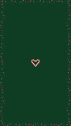 a green square with red and white hearts on it, surrounded by confetti