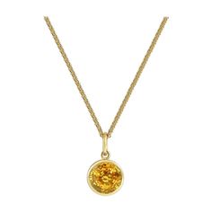 Handcrafted 1.50 Carats Yellow Sapphire 18 Karat Yellow Gold Pendant Necklace. The 7mm natural stone is set in our iconic hand pierced gold lace to let the light through. Our pendants are the ideal gift. Here presented on our finely knitted gold chains. Chain is included in the price, its length is 17 inches adjustable at 16 inches. Pendant measures 8mm diameter. Choose from our selection of precious stones and fine gems to fit ones birthstone or favorite color. Our lace on the reverse allows na Gold Round Gemstones For Anniversary, Yellow Gold Birthstone Gemstones, Round Shape, Yellow Gold Birthstone Gemstone, Round Gold Gemstones Fine Jewelry, Classic Round Gold Gemstones, Gold Round Birthstone Jewelry, Gold Round Cut Gemstones Fine Jewelry, Gold Gemstone Round Pendant Jewelry, Gold Birthstone Necklace With Round Pendant