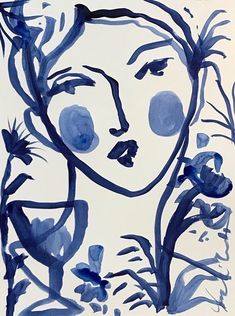 a drawing of a woman's face in blue ink