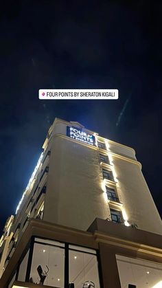 the four points by sheraton kerall is lit up at night