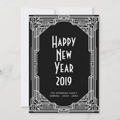 a black and white new year's card with the words happy new year on it