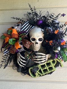 a skeleton wreath with the word creep on it