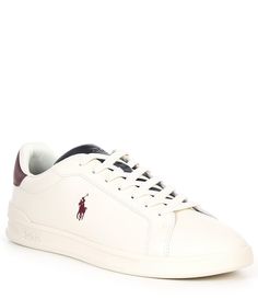 From Polo Ralph Lauren&#x2C; the Men's Heritage Court II Sneakers feature: Leather upperRounded toeReinforced heel with contrast heel tabSignature Pony embossed at the side“Polo” embossed at the tongue and debossed at the heelLace-up frontTongue and collar lined with meshDouble-faced liningPadded mesh insoleEVA midsoleTextured rubber outsoleImported. Ralph Lauren Shoes Mens, Classic American Style, Ralph Lauren Kids, Ralph Lauren Shoes, Ralph Lauren Collection, Dillard's, Polo Ralph Lauren Mens, Ralph Lauren Men, Mens Shoes Sneakers