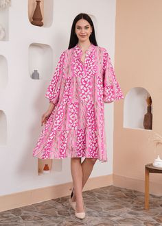 Infuse your wardrobe with a touch of wild charm through our Pink Leopard Smock Dress. The oversized silhouette, 3/4 sleeves, and captivating leopard print define casual chic. Crafted from viscose, this mini dress offers both comfort and style. In a delightful pink hue, it adds a playful yet trendy flair to your look. Perfect for various occasions, this dress effortlessly combines ease with fashion, making it a must-have for those seeking a bold and stylish ensemble. SPECS: Material: Viscose Colo Midi Dress Wedding, Broderie Dress, Midi Dress Wedding Guest, Dress Minimalist, Pink Summer Dress, Pink Beach, Oversized Dress, Pink Leopard Print, Beach Wear Dresses