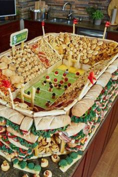 a football stadium made out of sandwiches and crackers