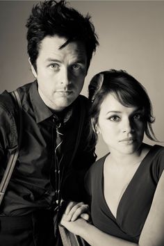 a black and white photo of two people