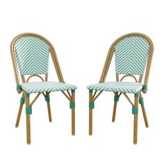 two chairs that are sitting next to each other on a white background and one is blue