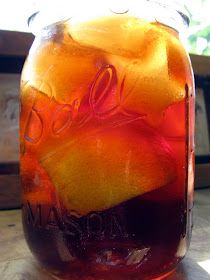 a jar filled with liquid sitting on top of a table