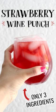 a hand holding a wine punch with the words strawberry wine punch only 3 ingredients on it