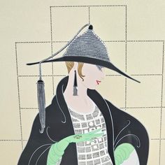 a woman wearing a black hat and green gloves with an umbrella on her head is standing in front of a tiled wall