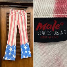 "Vintage 1960's Stars and Stripes Mod Hip Huggers Flare Hippie Denim Jeans. No Size Tag. Please check the measurements below. Good condition. General fading. (see photos) Label reads \"Male\". Original 1960's. Flared hip hugger stars and stripes flare hippie denim jeans. All Sales Final. Please ask any questions before purchase. Take a look at our Store for more Vintage Clothing - VintageOnHollywood. MEASUREMENTS Waist: 28\" Inseam: 31 1/2\" Full Outer Length: 38\" Leg Cuff Width: 9\" Rise: 7\"" American Flag Flare Jeans, 1970s Denim Bottoms, 1970s Fitted Denim Jeans, 1970s Fitted Denim Bottoms, 70’s Panel Jeans, 70s Jeans, Beatnik Style, 60’s Mod, Mens Slacks