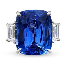 This breathtakingly large and visually striking cushion-shaped mixed cut sapphire showcases the ideal blue hue that makes sapphires so highly coveted. Weighing an extraordinary 30.21 carats, this rare gemstone is certified by C. Dunaigre as Madagascan in origin. A vibrant blue sapphire in this size is a true marvel. Flanked by two diamonds totaling 2.56 carats and set in luxurious platinum, this ring is a testament to nature and craftsmanship. Download the Certification Unique Sapphire Rings, Radiant Cut Engagement Rings, Sapphire Rings, Jewelry Drawing, Jewelry For Sale, Jewels Rings, Sapphire Diamond Ring, Rare Gemstones, Blue Sapphire Rings