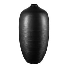 a large black vase sitting on top of a table