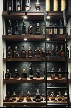 the shelves are filled with different types of liquor