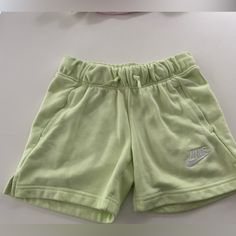 Brand New Juniors Nike Shorts Size M Without Tags Never Worn Nike Cotton Shorts For Playwear, Green Shorts With Pockets For Playwear, Green Nike Cotton Pants, Spring Playwear Shorts With Pockets, Nike Cotton Pants For Spring, Nike Green Cotton Bottoms, Green Bottoms With Pockets For Playwear, Green Bottoms With Elastic Waistband For Playwear, Spring Playwear Bottoms With Pockets