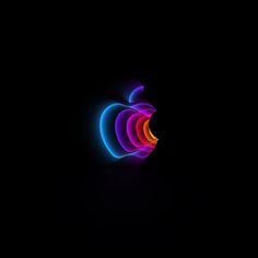 an apple logo in the dark with neon colors on it's back side and sides