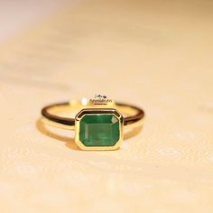 Green Emerald Solitaire Stacking Gold Ring For Women, Bezel Set Emerald Octagon Ring For Men, Authentic Emerald Tiny Pinky Ring Gift For Her Beautiful Green Color Natural Emerald Ring For Men & Women In Solid 14k Gold. A perfect daily wear gemstone stacking ring or wear it as a pinky ring. A 1.30 Carat Emerald cut emerald is precisely set as a solitaire and can be a tiny emerald birthstone ring gift for a women. This classic emerald bezel set solitaire ring can be a beautiful gift for mom or dad Octagon Solitaire Emerald Ring Gift, Gold Emerald Signet Ring Gift, Modern Green Emerald Signet Ring, Minimalist Green Emerald Ring With Polished Finish, Luxury Minimalist Polished Emerald Ring, Emerald Pinky Ring, Emerald Birthstone Ring, Stone Ring Design, Pinky Signet Ring