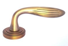 an image of a gold colored handle on a white background that looks like it is made out of metal