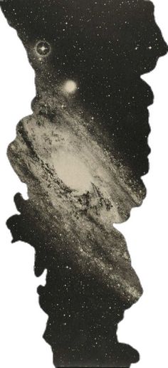 an image of the milky taken from space in black and white, with stars all around it