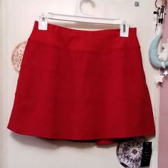 Drawstring Adjuster Inside Waistband Key Pocket Small Zipper Pocket Tiered Finish Skirt Over Shorts Combo Red Short Skort With Built-in Shorts, Red Cotton Lined Skirt, Red Stretch Skort Mini Length, Red Stretch Mini Skort, Red Stretch Mini Length Skort, Red Short Tennis Skirt For Spring, Red Cotton Skirted Skort, Red Cotton Skorted Skort, Red Cotton Skort Of Short Length