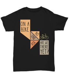 a black t - shirt with the words on a bike are we there yet?