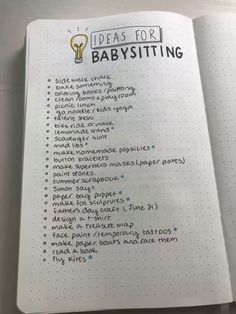 an open notebook with the words ideas for babysitting written on it