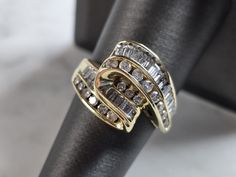 A WOMENS VINTAGE ESTATE 14K YELLOW GOLD MODERNIST DIAMOND FREEFORM RING.  THE RING WEIGHS 5.8g, AND IS A SIZE 7.5.  THERE ARE 1.0cts OF DIAMONDS IN THIS RING.  THE WIDTH OF THE RING IS 1/2".  ANY QUESTIONS PLEASE DO NOT HESITATE TO ASK.  BE SURE TO CHECK OUT SOME OF MY OTHER GREAT ITEMS UP FOR SALE.  THANK YOU. Luxury Modernist Hallmarked Rings, Modernist Multi-stone Ring, Luxury Modernist Gold Rings, Hallmarked Modernist Yellow Gold Jewelry, Freeform Ring, Ring Vintage, New People, Vintage Rings, Jewelry Watches