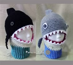 two crocheted hats with mouths and teeth are shown in front of each other