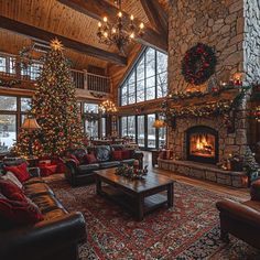 a living room filled with furniture and a christmas tree in the middle of the room