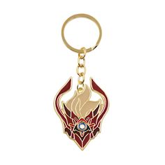 a metal keychain with a red and white design on the front, featuring an evil