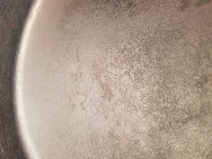 an old frying pan that is dirty and needs to be cleaned