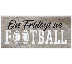 a wooden sign that says on friday's we football with an image of a ball