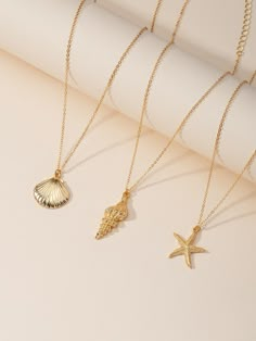 Gold Vacation   Zinc Alloy  Pendant Necklaces Embellished   Jewelry Jewellery Photo Shoot, Moodboard Pics, Shell Charm Necklace, Jewelry Mood Board, Jewellery Photo, Jewellery Shoot, Jewellery Photography Inspiration, Jewelry Product Shots, Creative Jewelry Photography