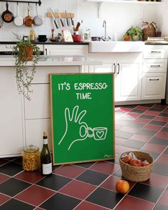 a green sign that says it's espresso time and two glasses on the floor