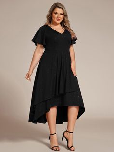 Shine with elegance in our Plus Size Ruffled Sleeves Glittery V-Neck Midi Wedding Guest Dress. This stunning dress features glittery fabric and charming ruffled sleeves, enhancing your style. The flattering V-neckline and midi length offer a sophisticated silhouette, perfect for any occasions. Designed for curvy figures, this dress ensures you feel confident and graceful. Fit: Please refer to size chart. Length: Midi Length. Sleeve Style: Short Sleeves. Closure: It is concealed a zipper up the b Oni Clothes, Plus Size Party Dresses For Wedding, Reception Dress Guest, Dress For Big Size Woman, One Piece Dress Knee Length, Vestidos Curvy, Midi Wedding Guest Dress, Formal Wedding Guest Dress, Plus Size Gowns