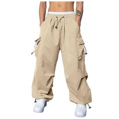 PRICES MAY VARY. Closure Type: Drawstring ; Material: Polyester Product Description:Introducing our Men's Baggy Cargo Pants Casual Parachute Cargo Pants, designed to offer both style and functionality for the modern man. These pants combine a loose fit with a hip hop harem design, making them a versatile and fashionable choice for various occasions.Crafted with care, these cargo pants feature a baggy and relaxed fit, providing comfort and freedom of movement. The parachute-style design adds a un Baggy Techwear Cargo Jeans In Khaki, Baggy Hip Hop Cargo Pants For Outdoor Activities, Baggy Khaki Hip Hop Cargo Pants, Baggy Khaki Parachute Pants For Outdoor Activities, Baggy Khaki Parachute Cargo Pants, Baggy Khaki Cargo Parachute Pants, Baggy Khaki Cargo Pants In Hip Hop Style, Hip Hop Baggy Cargo Pants For Outdoor, Hip Hop Style Baggy Cargo Pants For Outdoor