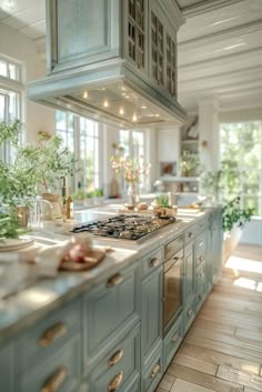 a kitchen filled with lots of counter top space next to an oven and stove top