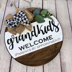 a wooden sign that says grandad's welcome parents by appointment