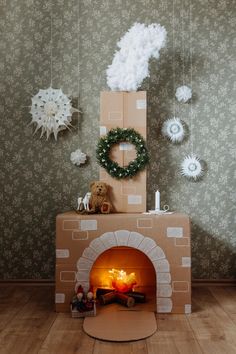 a room with a fire place and decorations on the wall, including wreaths hanging from strings