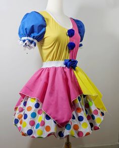 a dress made to look like a clown's costume on a mannequin