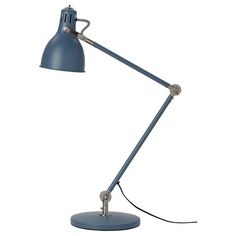 a blue desk lamp on a white background