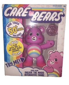 the care bears toy is pink and has a rainbow bear on it's chest