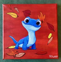 a painting of a blue dinosaur with autumn leaves on it's face and eyes